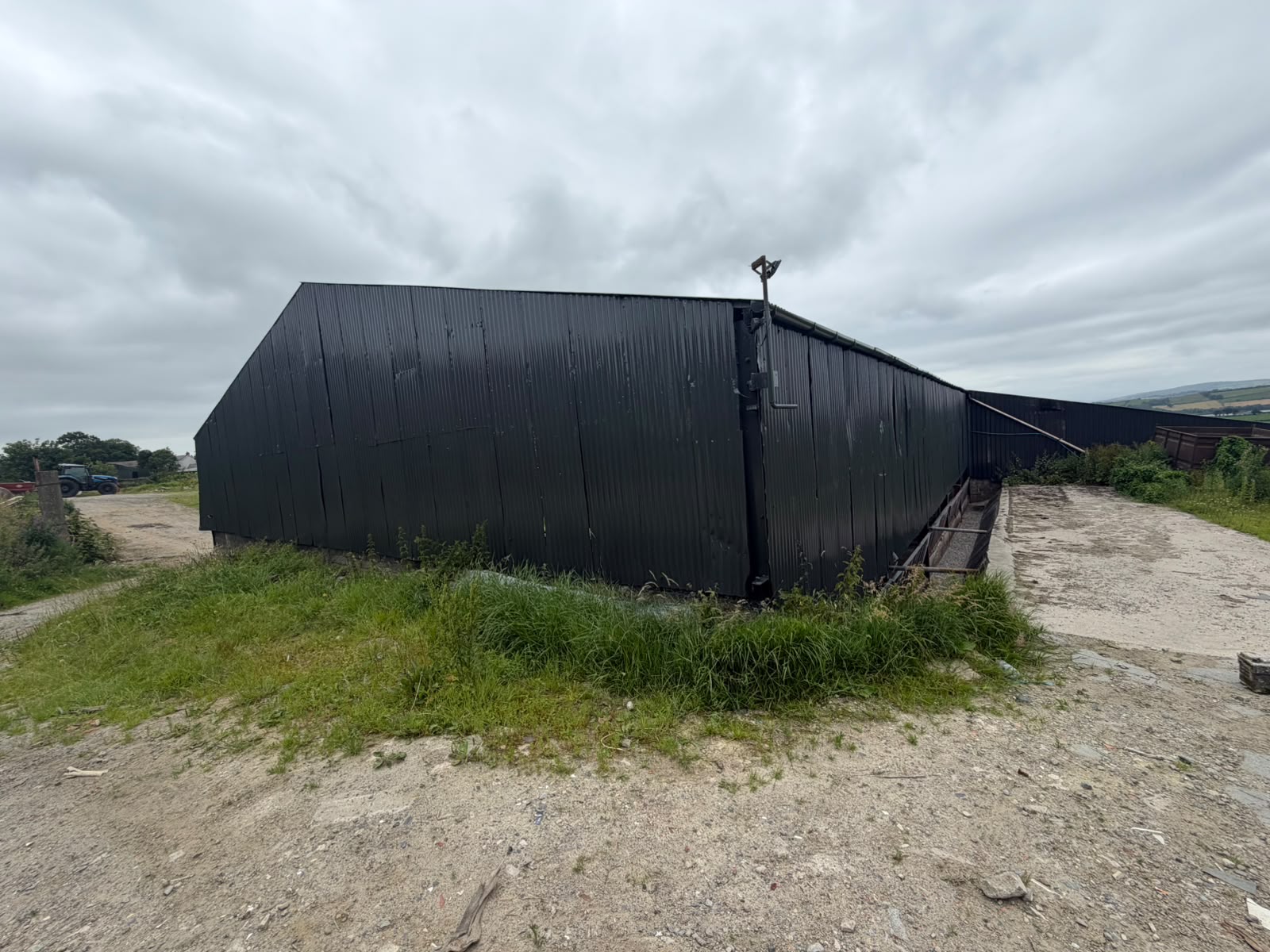 Same farm building resprayed in black